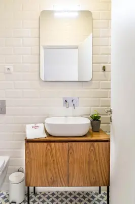 a bathroom with a sink and a mirror at Formosa 168 by Guestify in Porto