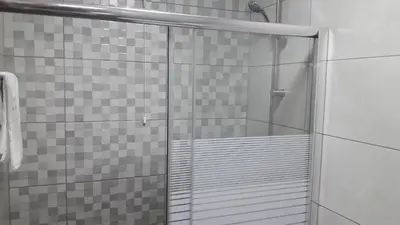 a shower with a glass door in a bathroom at Hotel S. Gabriel in Porto