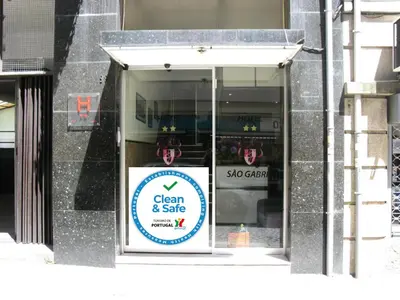 a sign in the window of a store at Hotel S. Gabriel in Porto
