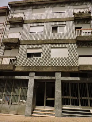 a building with a bunch of windows on it at Art Gallery Apartment in Porto