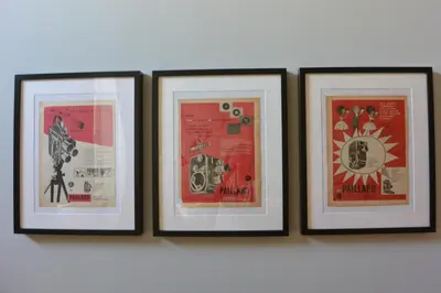 four framed pictures hanging on a wall at Casa Paillard, by Flat in Porto in Porto