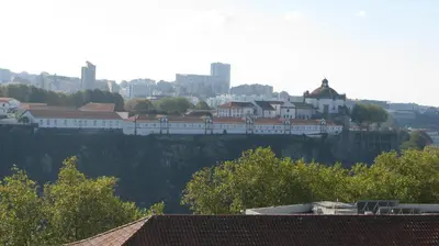 a view of a city with buildings on a hill at Residencial Porto Novo - Alojamento Local in Porto