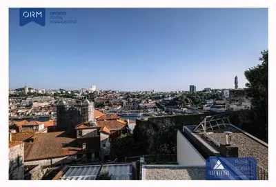 a view of a city with roofs and buildings at ORM - Virtudes Apartment in Porto