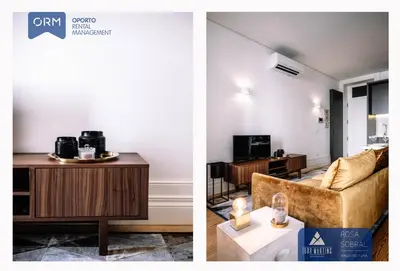 a living room with a couch and a table at ORM - Camões Apartment in Porto