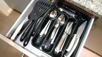 a bunch of utensils are in a drawer at Historical Center - Taipas Apartments in Porto