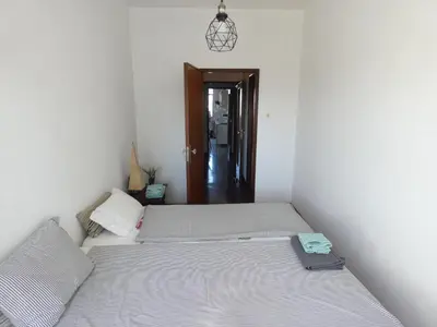 a living room with a couch and a table at Grandmotherhouse 2-7 Pax in Porto