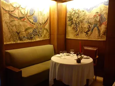 a table in a restaurant with a white table cloth at Hotel Miradouro in Porto