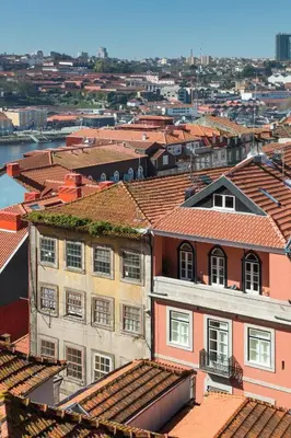 a view of roofs of buildings in a city at HM - Ribeira São João 2D in Porto