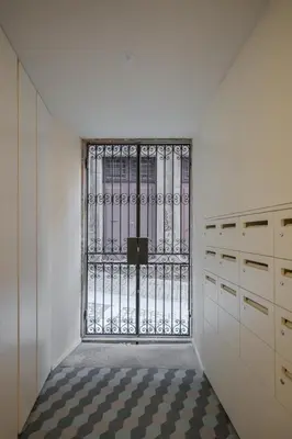 a room with a door with a window in it at HM - Ribeira São João 3F in Porto