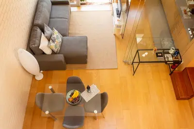 an overhead view of a living room with a couch at Portus Vita Apartamento T0 Duplex in Vila Nova de Gaia