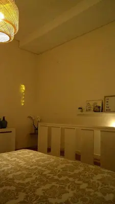 a bedroom with a bed and a counter in a room at Casa Braancamp II - Chic & Sweet in Porto
