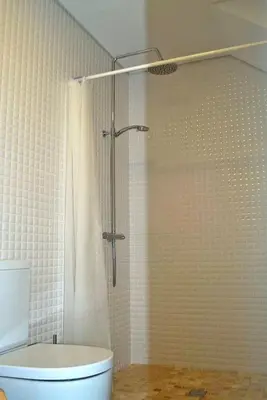 a bathroom with a shower with a toilet in it at Casa Braancamp II - Chic & Sweet in Porto