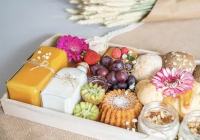 a wooden box filled with different types of food at UMA Santa Catarina - Pool & Fitness, Adults Only in Porto