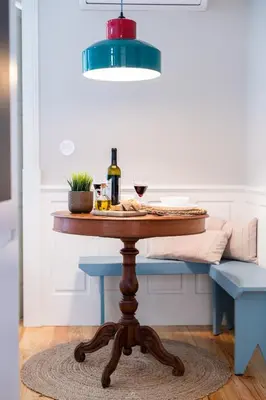 a table with a bottle of wine and a glass at Best Of Porto Apartment - BOP in Porto