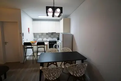 a room with a hallway with a light fixture at Stylish house - air cond, breakfast, free parking, by Porto with Love LDA in Vila Nova de Gaia