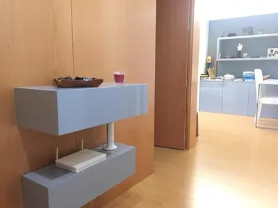a room with a table with a bowl on it at Maestro Appartment in Porto