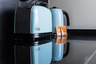 two microwaves are sitting on a counter top at GuestReady - Jazz Apartment in Porto