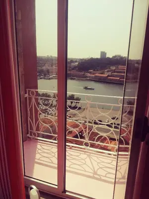 a view of a river from a room with a window at Oportobestview - TopLoft in Porto