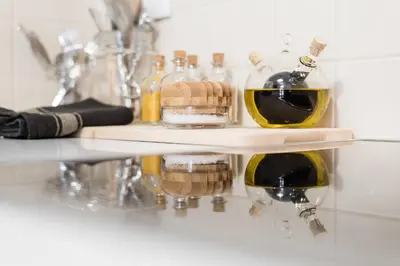 a shelf with bottles of wine on a wall at SOBRI Cork House - Sustainable Loft in Porto