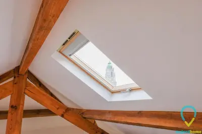 a skylight in the attic of a house at Loft Almada in Porto