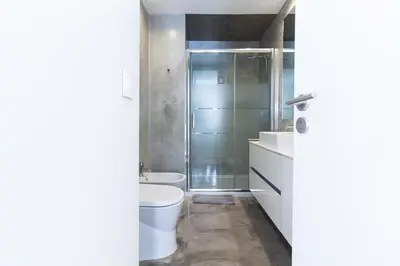 a bathroom with a toilet and a shower at ON Apartments - Violin in Porto