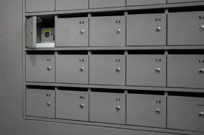 a bunch of lockers are on a shelf at Formosa Apartment with Free Parking and Historic Charm! in Porto