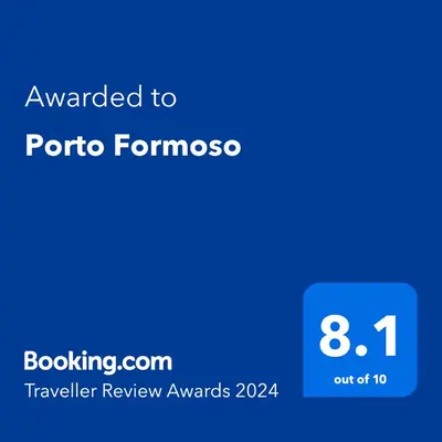 a blue text box with the words awarded to toronto fominos at Formosa Apartment with Free Parking and Historic Charm! in Porto