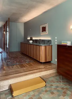 a bathroom with a tub in the middle of a room at Hotel Tipografia do Conto by Casa do Conto in Porto