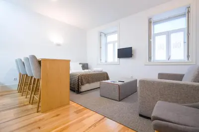 a living room with a bed and a couch at ON Apartments - Palace - Free Parking in Porto