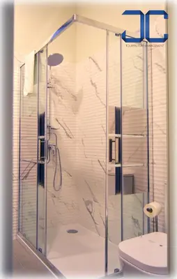 a shower stall with a toilet in a bathroom at Click! Apartment by JC in Porto