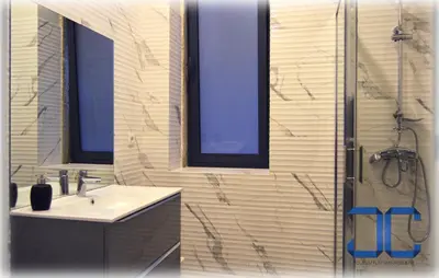 a bathroom with a sink and a shower at Click! Apartment by JC in Porto