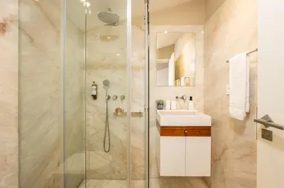 a bathroom with a shower and a sink at RS Porto Historic Center in Porto