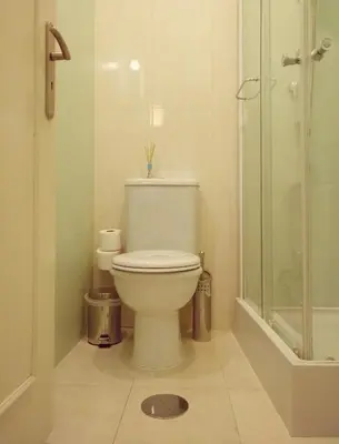 a bathroom with a toilet and a shower at O'Porto Seven - Guest House in Porto