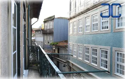 a hotel room with a bed with towels on it at Market Place (with 2 Bedrooms) by JC in Porto