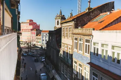an overhead view of a city street with buildings at Aposentus -Romantic Mezzanine Apartment With a Balcony in Porto