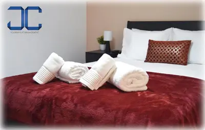 a hotel room with towels on a bed at Riverside (with 3 Bedrooms) by JC in Porto