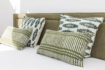a group of pillows sitting on top of a couch at VIVA In the MOOD in Porto