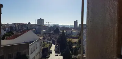 a view of a city from a building at City Heart Rooms in Porto