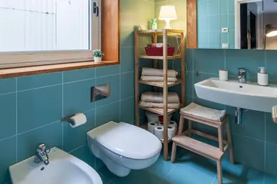 a bathroom with a toilet and a sink at NiP Apartment | Porto City Center Near All Sights in Porto