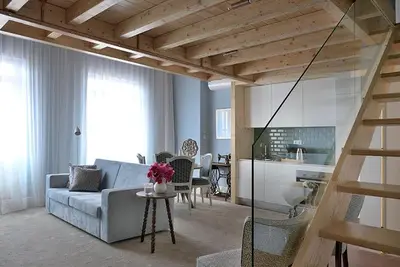 a living room with a couch and a table at Mayor's Apartments in Porto