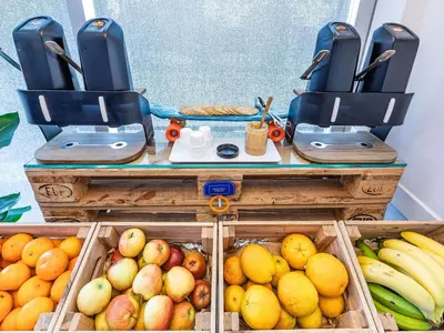 a display of fruits and vegetables in baskets on a table at Hotel ibis Budget Porto Gaia in Vila Nova de Gaia