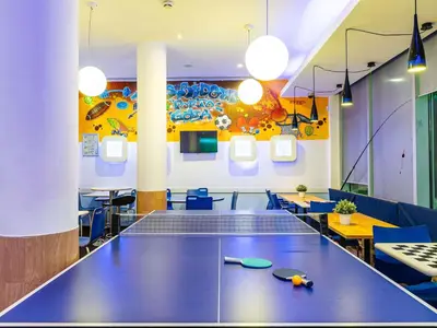 an office with a ping pong table and chairs at Hotel ibis Budget Porto Gaia in Vila Nova de Gaia