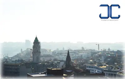 a view of a city with a clock tower at Pardal Apartment by JC in Porto