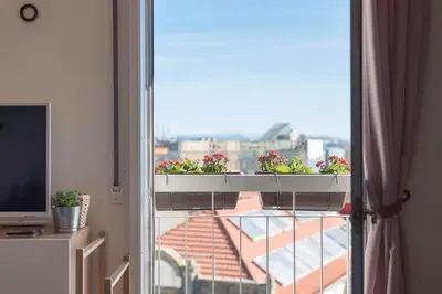 a balcony with two planters with plants on it at SP199 Flat by in Porto