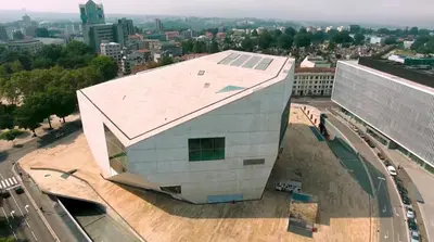 a building with a roof on top of a city at Exquisite Retreat in a Traditional Area of Porto in Porto