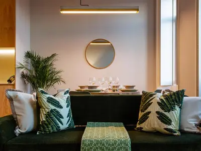 a living room with a couch and a table with glasses at Domum 3 in Porto
