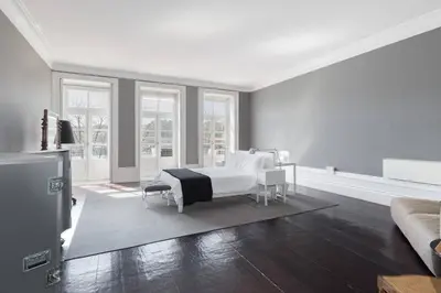 a white bedroom with a bed and a couch at GuestReady - Innvict Residences in Porto
