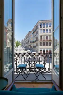 a balcony with a view of a city street at BOUTIQUE Rentals - Toledos One & Only Apt in Historical center of Porto in Porto