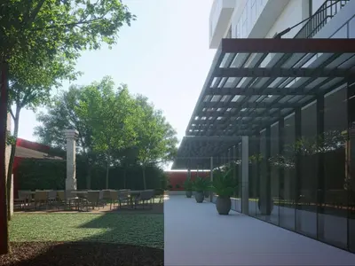 an external view of a building with a patio with plants at NH Porto Jardim in Porto