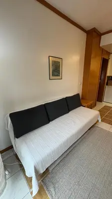 a bedroom with a large bed and a window at Musica4 in Porto